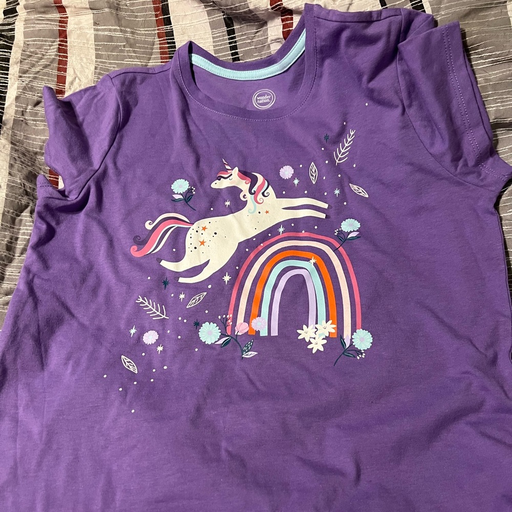 Short sleeve top has the unicorn print for this little girls who love them